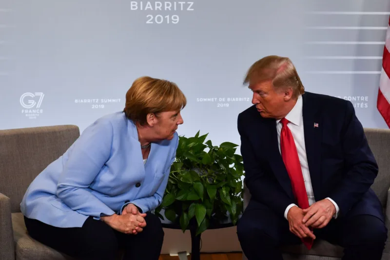 Trump merkel scaled