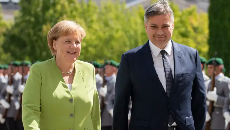 Denis i merkel scaled
