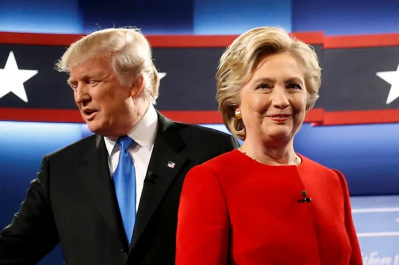 Image: Trump and Clinton greet one another as they take the stage for their first debate at Hofstra University in Hempstead, New York, U.S.