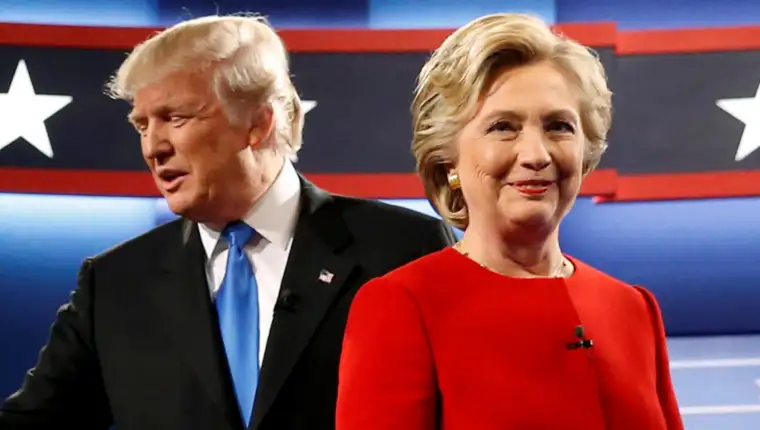Image: Trump and Clinton greet one another as they take the stage for their first debate at Hofstra University in Hempstead, New York, U.S.