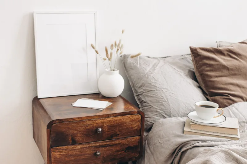 Portrait,White,Frame,Mockup,On,Retro,Wooden,Bedside,Table.,Modern