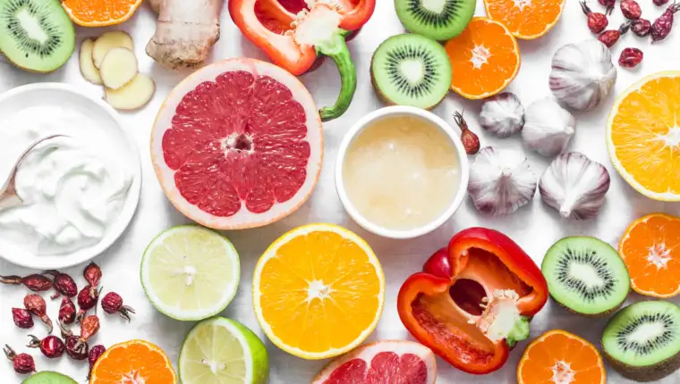 Immunity  boosting food set on a light background . Healthy lifestyle concept, winter prevention of colds. Flat lay, top view