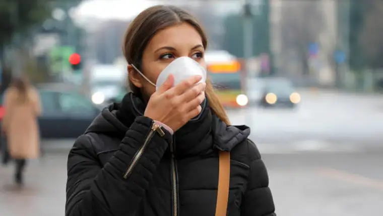 Covid-19,Pandemic,Coronavirus,Woman,In,City,Street,Wearing,Protective,Face