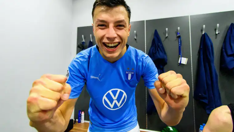 210824 Anel Ahmedhodzic of Malmˆ FF celebrate in the locker room after winning the UEFA Champions League playoff match