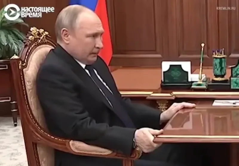 putin ruka