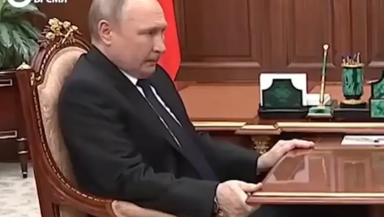 putin ruka