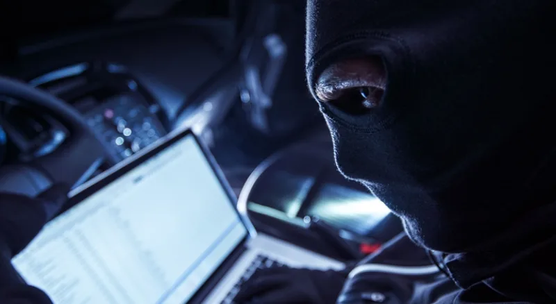 hacker-inside-the-car-royalty-free-image-1616620019_