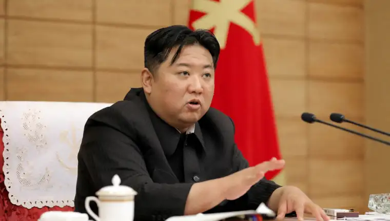 FILE PHOTO: North Korean leader Kim Jong Un attends a Worker's Party meeting on coronavirus disease (COVID-19) outbreak response