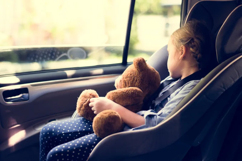 A,Little,Girl,In,A,Car,Seat