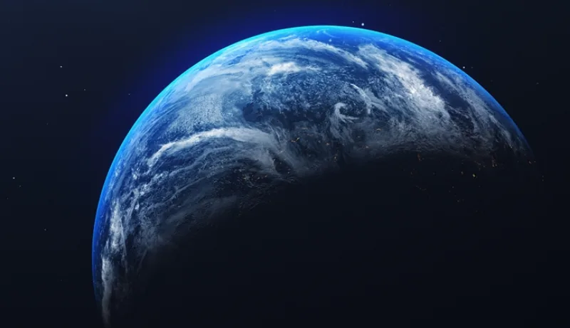 Close-Up Of Earth Against Blue Sky At Night