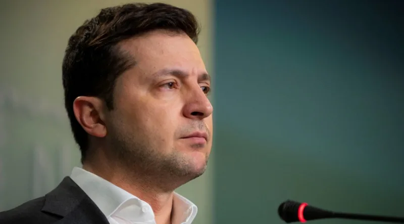 Ukrainian President Volodymyr Zelenskiy attends a news briefing in Kyiv