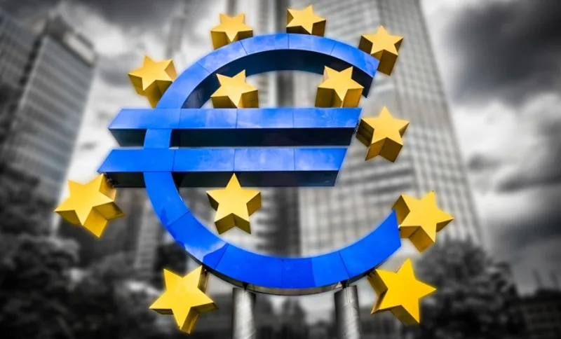 euro-sign-at-european-central-bank-headquarters-in-frankfurt--germany-with-dark-dramatic-clouds-symbolizing-a-financial-crisis-912146250-abd284d556264519915497fae24bc701
