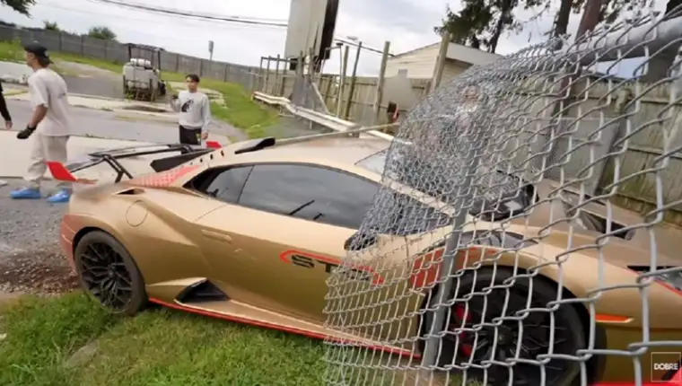 Dobre-brothers-crash-Huracan-STO-through-75-80-dragway-fence