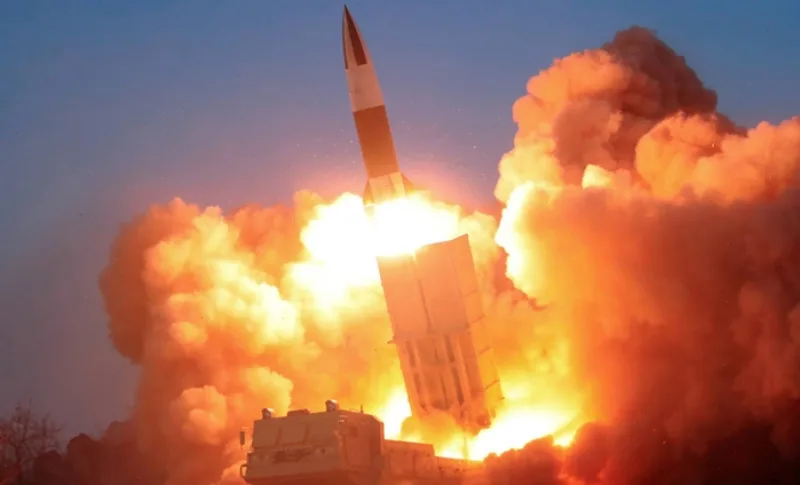 FILE PHOTO: North Korean leader Kim Jong Un observes the firing of suspected missiles