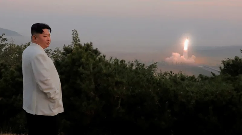 FILE PHOTO: North Korea's leader Kim Jong Un oversees a missile launch at an undisclosed location in North Korea