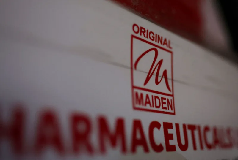 FILE PHOTO: FILE PHOTO: Logo of the Maiden Pharmaceuticals Ltd. company is seen on a board put up outside their office in New Delhi,