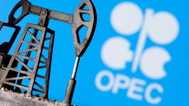 FILE PHOTO: A 3D-printed oil pump jack in front of the OPEC logo in this illustration picture