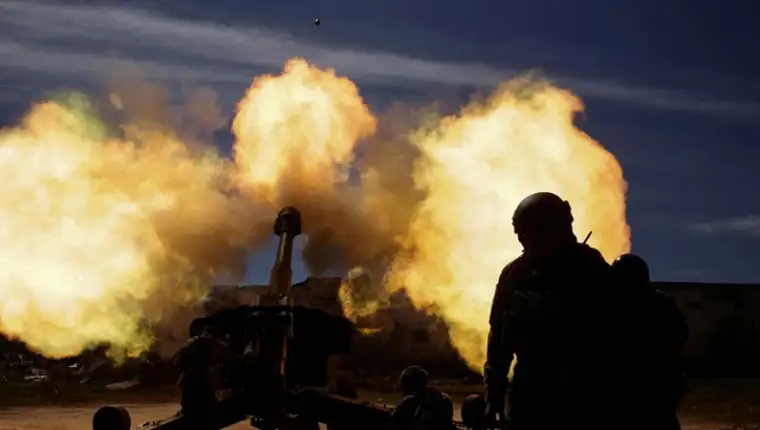 FILE PHOTO: Members of the Ukrainian Volunteer Corps fight against Russian troops in Zaporizhzhia region