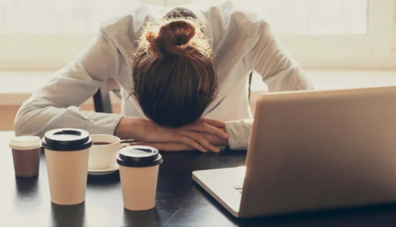 Tired woman in the office