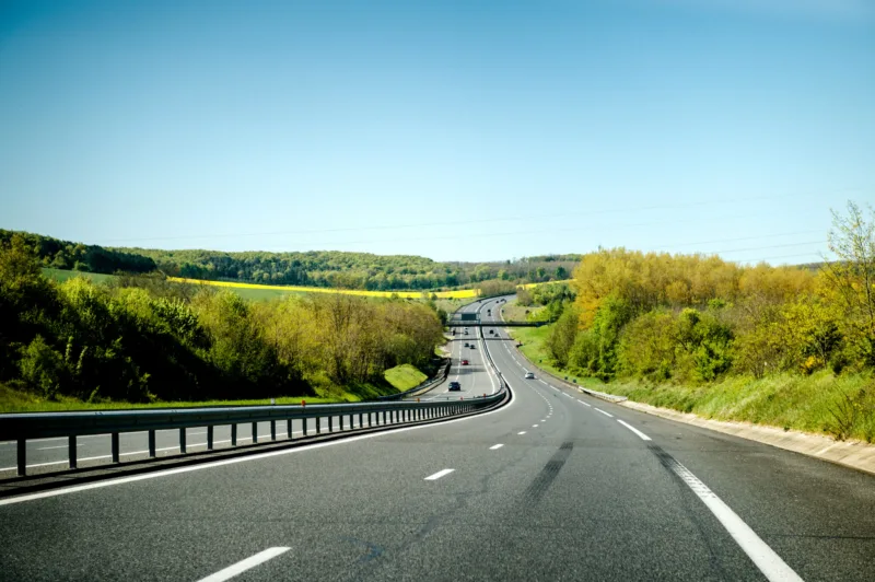 Large,French,Highway,Perspective,View,With,Cars,Commuting,Fast,On