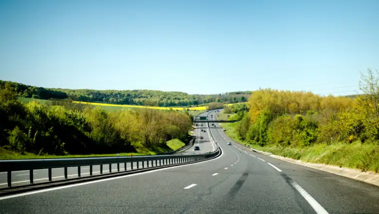 Large,French,Highway,Perspective,View,With,Cars,Commuting,Fast,On