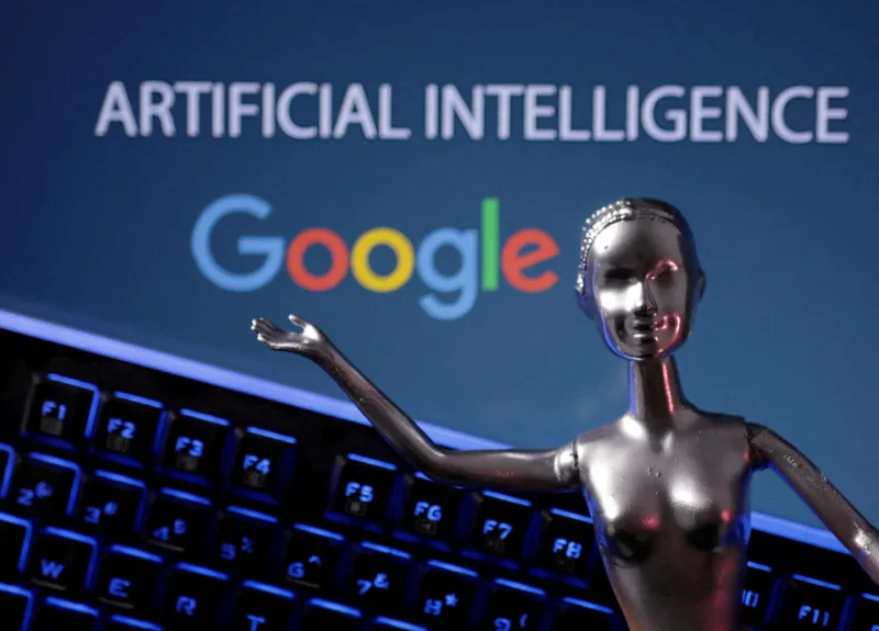 FILE PHOTO: Illustration shows Google logo and AI Artificial Intelligence words