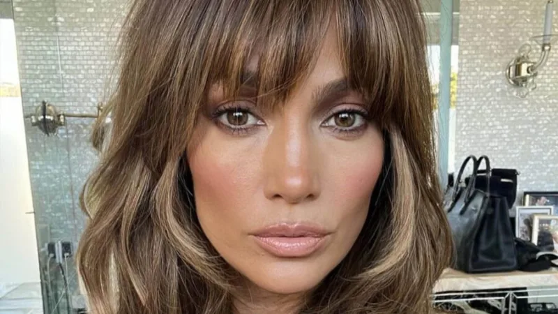 Jennifer Lopez writes " #ThisIsMeNow @jlobeauty @hairbylorenzomartin