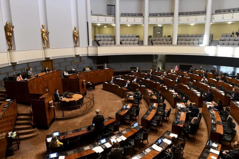 Members of the Finnish Parliament attend a debate for the EU COVID-19 recovery plan in Helsinki