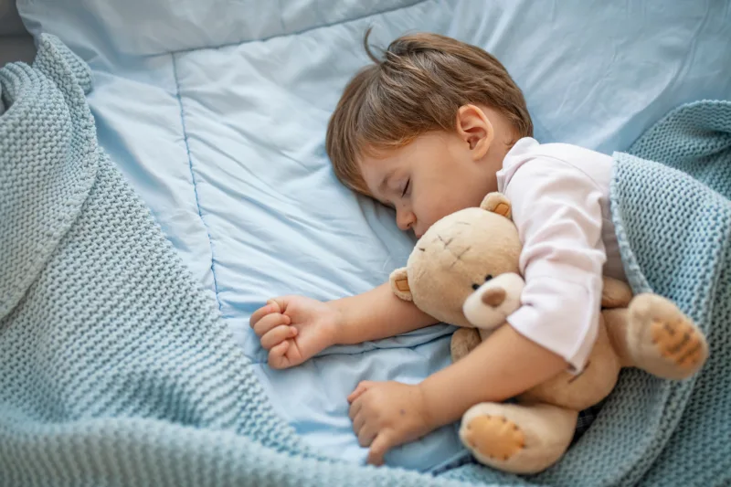 Healthy,Child,,Sweetest,Blonde,Toddler,Boy,Sleeping,In,Bed,Holding