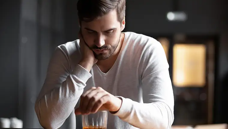 Upset,Young,Man,Drinker,Alcoholic,Sitting,At,Bar,Counter,With