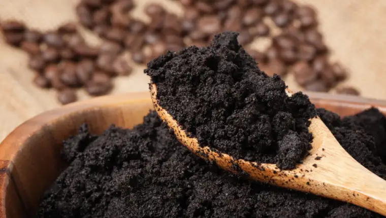 Closeup,Detail,Of,Coffee,Ground,In,Wooden,Bowl