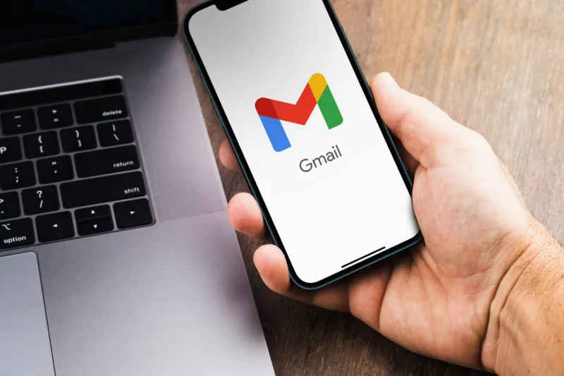 Male,Hand,Holding,A,Smartphone,With,Gmail,App,On,The