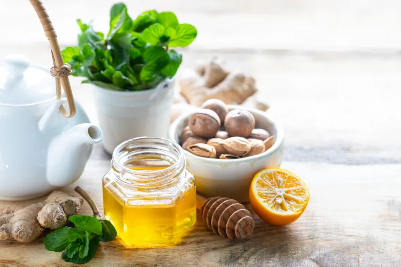set of products to boost the immune system. Honey, lemon, nuts, ginger to Immunity boosting. copy space