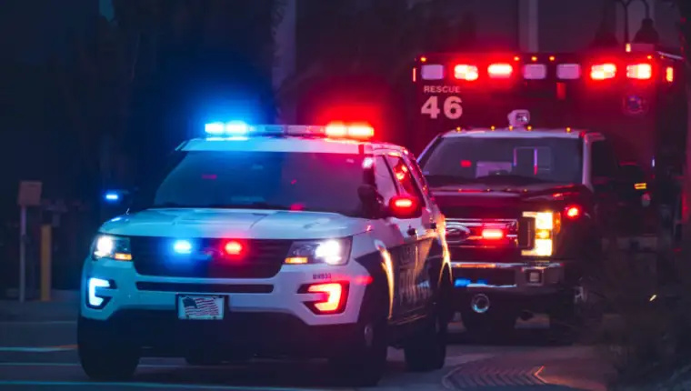 American,Police,Car,And,Emergency,Truck,With,Blue,And,Red