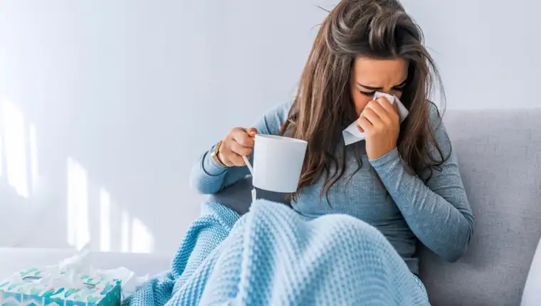 Sick,Woman,With,Headache,Sitting,Under,The,Blanket.,Sick,Woman