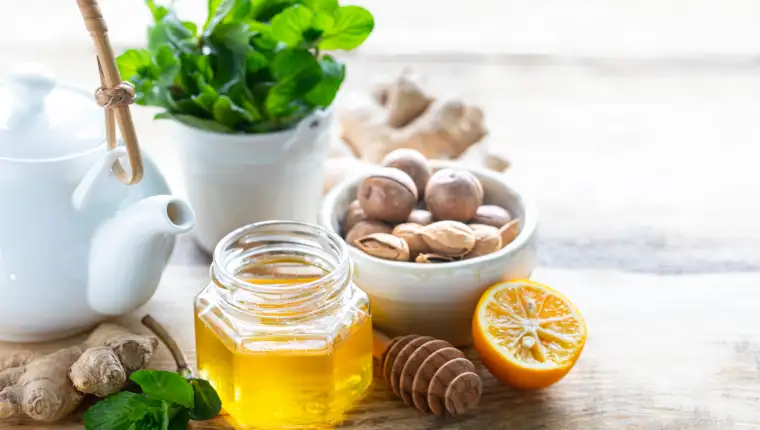 set of products to boost the immune system. Honey, lemon, nuts, ginger to Immunity boosting. copy space