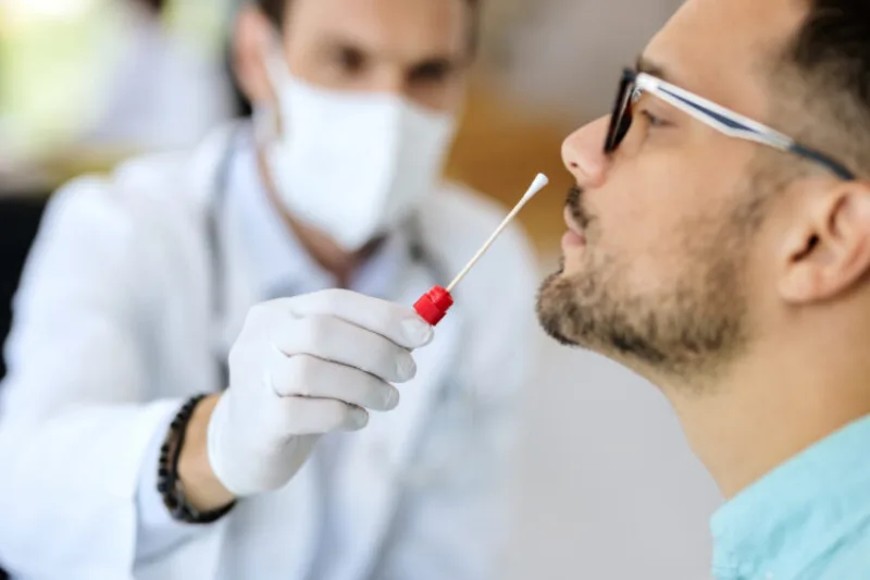 Close-up,Of,Young,Man,Getting,Pcr,Test,At,Doctor's,Office