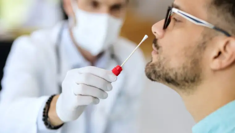 Close-up,Of,Young,Man,Getting,Pcr,Test,At,Doctor's,Office