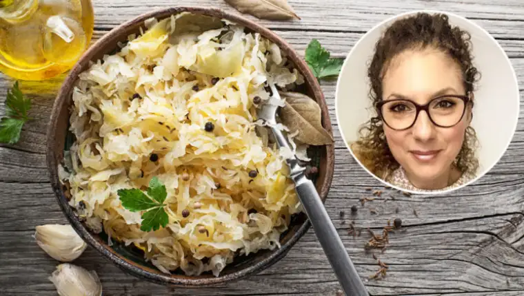Homemade,Sauerkraut,With,Black,Pepper,And,Parsley,In,Wooden,Bowl