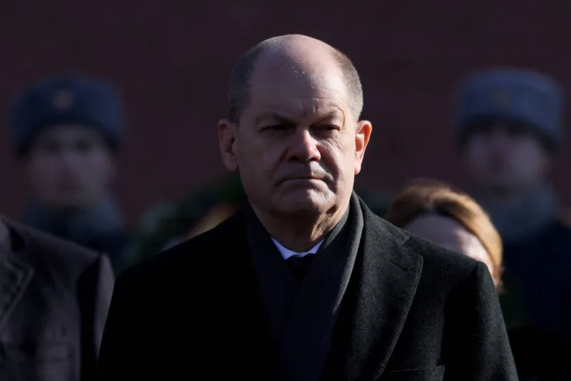 FILE PHOTO: German Chancellor Scholz takes part in a wreath-laying ceremony in Moscow