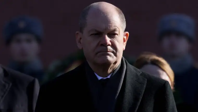 FILE PHOTO: German Chancellor Scholz takes part in a wreath-laying ceremony in Moscow