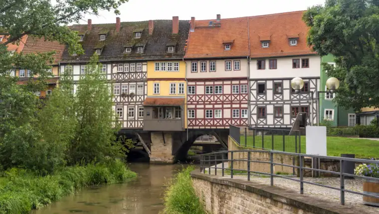 View of Krämerbrucke bridge with the historic houses on the Gera river, Erfurt, Germany