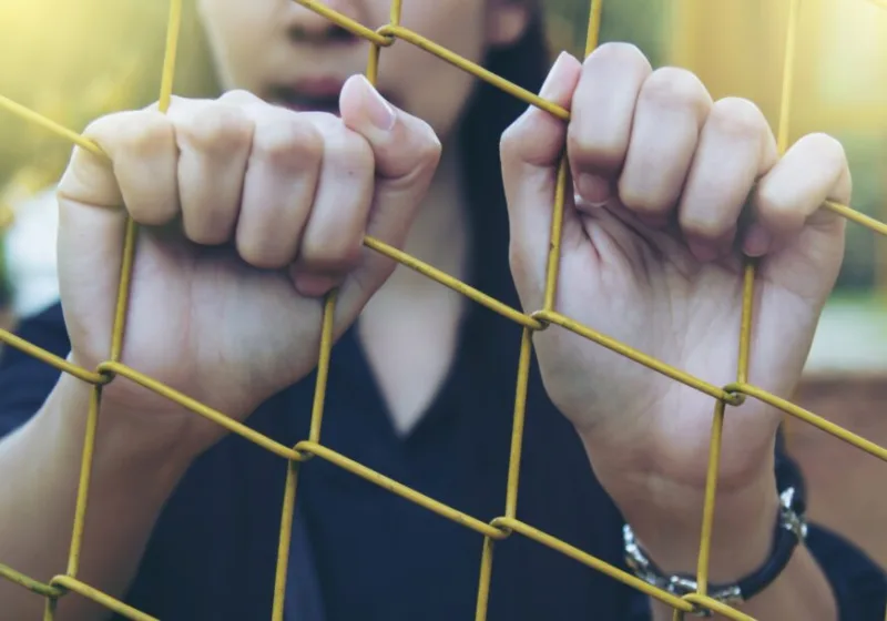 Girl and cage