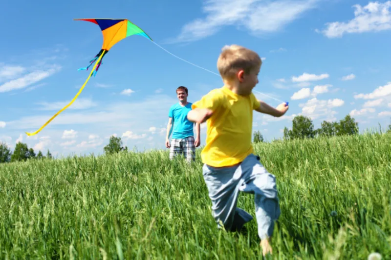 Father,With,Son,In,Summer,Playing,With,Kite
