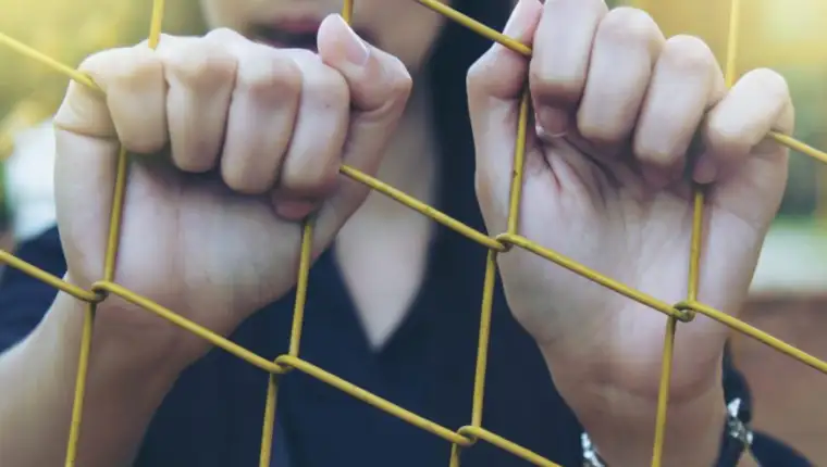 Girl and cage