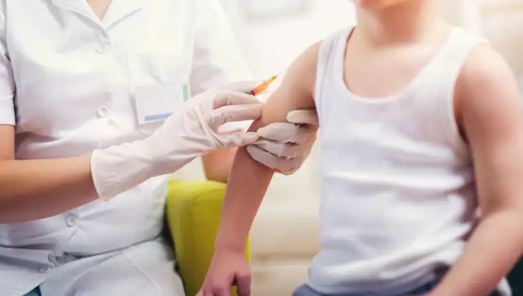 Pediatrician,Makes,Vaccination,To,Small,Boy