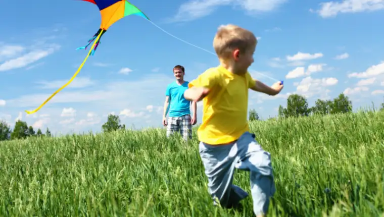 Father,With,Son,In,Summer,Playing,With,Kite