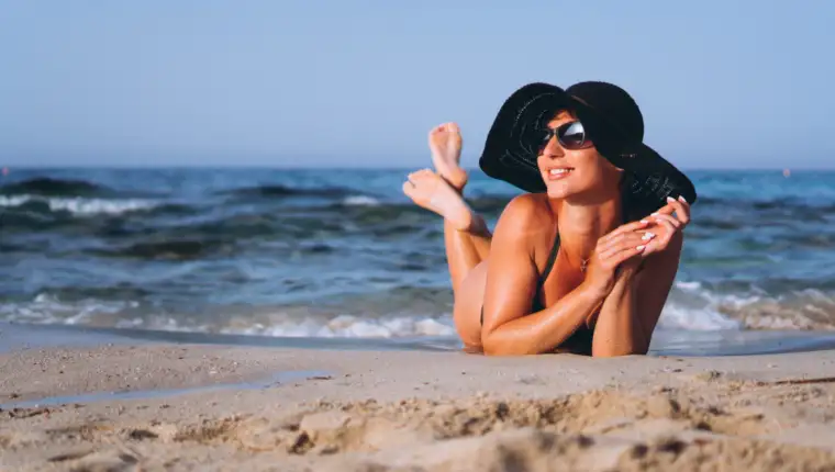 Beautiful woman by the ocean