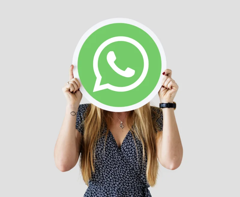 Woman holding a social network icon