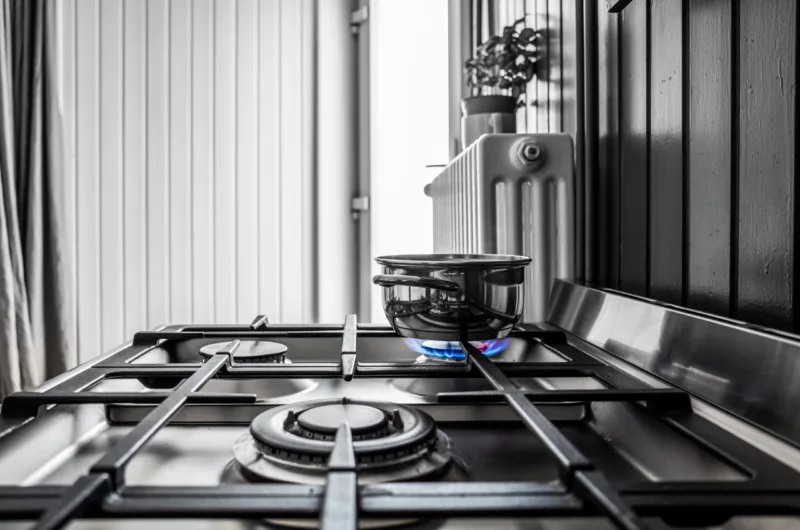 Small metal pan on the stove in the kitchen